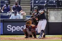  ?? FRANK FRANKLIN II — THE ASSOCIATED PRESS ?? Yankees’ Gary Sanchez hits a home run during last Monday’s spring training game against the Detroit Tigers in Tampa, Fla.