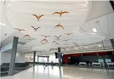  ??  ?? The flock of glass birds that ‘‘flies’’ above you on the walk to the Auckland Airport departure gates is a classic sign ofa management that cares about the overall customer experience.