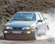 ?? FOTO: FORD/DPA ?? Kräftig: Nach dem Facelift des Sierra lieferte Ford 1988 die sportliche Cosworth-Variante mit 204 PS nach.