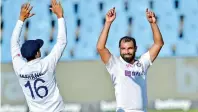  ?? ?? India’s Mohammed Shami celebrates with Mayank Agarwal after the dismissal of South Africa’s Kagiso Rabada