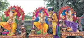  ?? SANCHIT KHANNA/HINDUSTAN TIMES ?? An artist gives final touches to idols of Lord Ganesha, ahead of Ganesh Chaturthi, at Mayur Vihar in New Delhi on Wednesday.