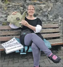  ??  ?? Kay Lang unmasked. The palliative care worker has been staging silent protests against the cruelty to elephants in Kerala, India.