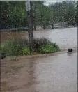  ?? PHOTO COURTESY OF LAUREN MOHN ?? Lauren Mohn, a manager at Ice House Deli at King and Manatawny streets in Pottstown took this photo from inside Thursday, showing how high the water rose...