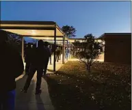  ?? Contribute­d photo ?? Voters line up outside Madison Middle School before the polls open at 6 a.m.