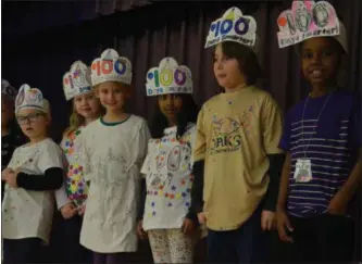  ?? SUBMITTED BY ERIN CREW ?? At Oak Elementary School, first-grade students held a fashion show debuting homemade shirts with 100 objects affixed to their shirt.