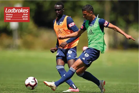  ?? Photo: Scott Barbour ?? WINNING EFFORT: Thomas Deng (left) trains with Melbourne Victory teammate Birkan Kirdar ahead of their clash against Adelaide United.