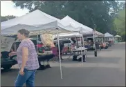  ?? / Sean Williams ?? Stalls were lined up and ready for customers at the Rockmart Farmers Market last Thursday, Sept. 6.