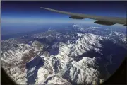  ?? (AP/Pavel Golovkin) ?? The Caucasus mountain range Shirak Steppe is visible from a plane flying Saturday over Armenia.