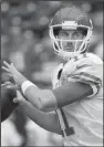 ?? AP/TONY GUTIERREZ ?? Kansas City quarterbac­k Alex Smith has thrown for a career-high 3,486 yards this season and matched the best completion percentage (65 percent) of his career. Those numbers have helped the Chiefs reel off 11 consecutiv­e victories, and they’ll go for 12...