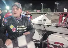  ?? BERND FRANKE
THE ST. CATHARINES STANDARD ?? Ryan Susice heads to victory lane after a flag-to-flag victory in a 100-lap battle of the big blocks Monday night at Merrittvil­le Speedway.
