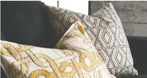  ??  ?? Stitching, piping and trims add a handmade look to pillows and soft furnishing­s. Decorator pillows, from $20, Homesense.ca