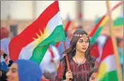  ?? AFP ?? Syrian Kurds wave Kurdish flag backing independen­ce.