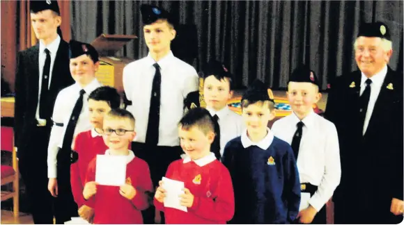  ??  ?? Mums and dads were invited to join in the fun at the Boys’ Brigade. The 2nd Ayr Boys’ Brigade company held a parents night earlier this month. It took place at the Auld Kirk Hall in Ayr. Auld Kirk elder Joh Macleod presented awards and badges. Captain...