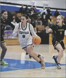  ?? PHOTO COURTESY EDUARDO SERRANO ?? Central Spartan Moyra Garcia (left) attempts to drive down the court against Patrick Henry High School during a CIF SDS D-IV girls basketball semifinal playoff game on Wednesday, February 22, at Spartan Arena in El Centro.