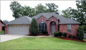  ?? PHOTOS BY LINDA GARNER-BUNCH/ARKANSAS Democrat-gazette ?? A quiet cul-de-sac lot provides the perfect setting for this four-bedroom, two-bath home.