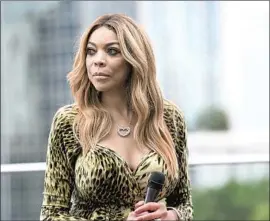  ?? Paras Griffin Getty Images ?? WENDY WILLIAMS doesn’t care if you do: The answer to her oft-quoted greeting of “How you doin’?” became complicate­d when she became gossip fodder.