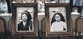  ?? Yasuyoshi Chiba AFP/Getty Images ?? POPE FRANCIS proclaimed Francisco and Jacinta Marto saints at the start of Mass marking the centenary of their visions of the Virgin Mary in Portugal.