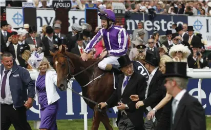  ??  ?? Australia with jockey Aiden O’Brien after yesterday’s victory of the English Derby