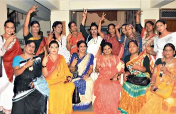  ??  ?? TWO CHEERS Transgende­r activists from Odisha with Meera Parida (seated, third from right) after the LS passed the bill