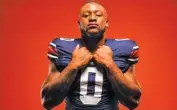  ?? AUBURN PHOTO ?? Auburn sophomore linebacker Owen Pappoe displays the No. 0 jersey he will be wearing this fall.