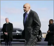  ?? ASSOCIATED PRESS FILE PHOTO ?? Sen. John Fetterman, D-Pa., walks to a motorcade vehicle after stepping off Air Force One behind President Joe Biden, Feb. 3, at Philadelph­ia Internatio­nal Airport in Philadelph­ia.