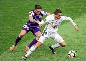  ?? GETTY IMAGES ?? Wellington Phoenix midfielder Dario Vidosic went down with a knee injury on Sunday/