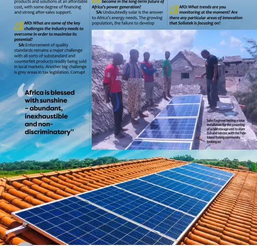  ??  ?? Sales Engineer testing a solar installati­on for the powering of a cold storage unit to store fish and lobster, with the Pate Island fishing community looking on