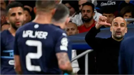  ?? AFP/VNA Photo ?? EURO BLOW: Manchester City’s Spanish coach Pep Guardiola reacts during the UEFA Champions League semi-final second leg football match between Real Madrid CF and Manchester City at the Santiago Bernabeu stadium in Madrid on May 4.