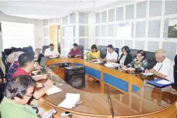  ??  ?? VIOLATIONS FOUND – Environmen­t and Natural Resources Region 13 Director Felix S. Alicer (seated at the top end of the table) presides over a meeting of the Task Force Siargao to review the data analysis of the 1,298 business establishm­ents in the popular island destinatio­n. (Photo courtesy of DENR 13/ Mike U. Crismundo)