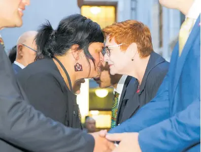  ?? Photo / Getty Images ?? Foreign Minister Nanaia Mahuta offers Australian counterpar­t Marise Payne a hongi.