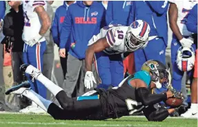  ??  ?? Jalen Ramsey’s intercepti­on that clinched Jacksonvil­le’s win Sunday further blurred the line on what is a catch. TOMMY GILLIGAN/USA TODAY SPORTS