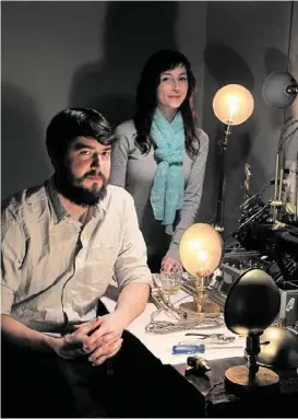  ?? Mayra Beltrán / Houston Chronicle ?? James and Carissa Long’s Long Made Co. sells industrial-style lamps. At their home in Houston’s Sixth Ward, the dining room table serves as a work station.