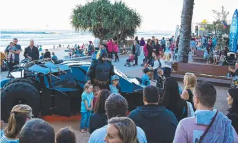  ??  ?? Batman and the Batmobile are inundated in Surfers Paradise during Seafire two weeks ago.