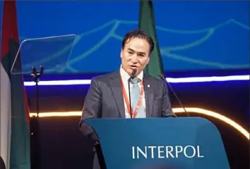  ?? South Korea National Police Agency/pool via AP ?? South Korea’s Kim Jong Yang speaks Wednesday during the Interpol General Assembly in Dubai, United Arab Emirates. Kim was elected as Interpol’s president on Wednesday, edging out a longtime veteran of Russia’s security services who was strongly opposed by other nations.