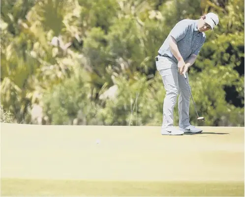  ??  ?? 0 Bob Macintyre putts on the 11th green during the final round of the US PGA Championsh­ip yesterday