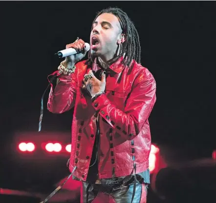  ?? Brian van der Brug Los Angeles Times ?? VIC MENSA raps frankly about depression and addiction, both on stage at the Forum and on his album “The Autobiogra­phy.”