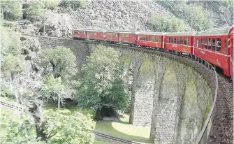  ?? RICK STEVES ?? Taking a train such as Switzerlan­d’s Bernina Express keeps you close to Europe’s charms.