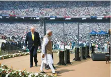  ?? AFP-Yonhap ?? Former U.S. President Donald Trum, left, and India’s Prime Minister Narendra Modi arrive to attend the “Namaste Trump” rally at Sardar Patel Stadium in Motera on the outskirts of Ahmedabad, Feb. 24, 2020.