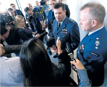  ?? SEAN KILPATRICK/THE CANADIAN PRESS ?? Lt. Gen. Pierre St-Amand speaks to media after appearing as a witness at a commons national defence committee in Ottawa on Thursday. The committee is hearing witnesses on Canada’s abilities to defend itself and our allies in the event of an attack by...