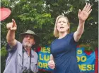  ?? (Carlo Allegri/Reuters) ?? SEN. KIRSTEN GILLIBRAND waves at youths incarcerat­ed at a dentition facility near Miami last month.