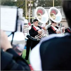  ?? TIMES photograph by Annette Beard ?? Pea Ridge Band members Joseph Jimenez and Tate Christense­n recently performed on their tubas in Blackhawk Stadium before a football game and at halftime.