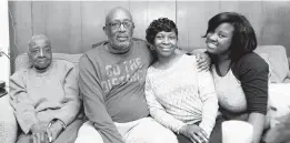  ?? JOSHUA MCKERROW/CAPITAL GAZETTE ?? Sylvia McKinney, from left, Kirby McKinney Sr., Tracy McKinney, and Janai McKinney in the McKinney home.