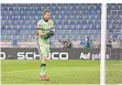  ?? FOTO: DPA ?? Lukas Hradecky ist nach seinem groben Patzer geknickt.