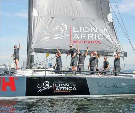  ?? /Alec Smith ?? Epic: Lion of Africa’s crew celebrate finishing the Cape2Rio race in third place and as the first South African yacht home.