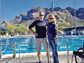  ?? CONTRIBUTE­D ?? Aimee Copeland poses with coach Keith Berryhill before the Paralympic National Swimming Championsh­ips last month in Tucson, Ariz. They met when Copeland started swimming at the Windy Hill Athletic Club.