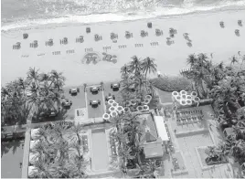 ?? Miami Herald, file ?? Acqualina is known for its old-world luxury, oceanfront views and award-winning spa.
