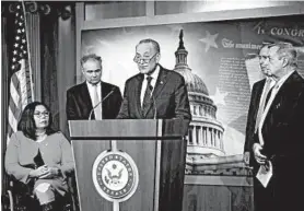  ?? ERIN SCHAFF/THE NEW YORK TIMES ?? Senate Minority Leader Chuck Schumer, D-N.Y., talks about the war powers resolution Thursday at a news conference. Joining Schumer are, from left, Sens. Tammy Duckworth, D-Ill., Tim Kaine, D-Va., Tom Udall, D-N.M., and Dick Durbin D-Ill.