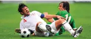  ??  ?? Georgia’s Kakha Kaladze and is tackled by Stephen Hunt during the 2010 World Cup qualifier in Mainz DAVID MAHER / SPORTSFILE