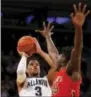  ?? KATHY WILLENS — THE ASSOCIATED PRESS ?? Villanova guard Josh Hart (3) goes up for two as St. John’s forward Darien Williams (45) defends in the first half Thursday at Madison Square Garden.