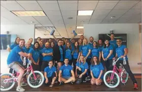  ?? SUBMITTED PHOTO ?? Fingerpain­t employees pose in the Conshohock­en office for the company’s 2017 Philanthro­py Day. This year the staff will collaborat­e with The Pack Shack on assembling non-perishable meals for the Manna on Main Street food pantry in Lansdale.